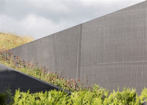 Sloped Green Roof Covers Split Level Home