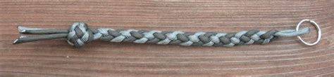 Use the same weaving technique, pulling in small amounts of hair from either side of the braid. knives and lanyards: 4 strand braid ending in double lanyard knot