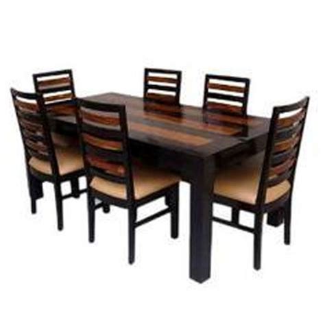 Artistically designed modern dining table. Six Seater Dining Table with 5 Years Warranty at Rs 25000 ...
