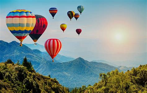 Beautiful View Of Mountain With Hot Air Balloons On Morning At T