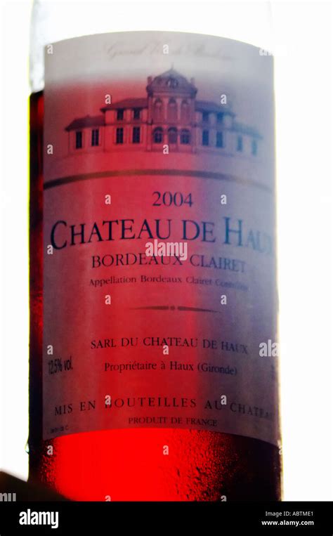 a bottle of chateau de haux rose clairet wine backlit chateau de haux premieres cotes de
