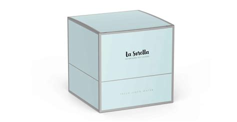 Delicious cake with candles, colorful gifts and confetti on blue background. Printed Pack - Custom Candle Boxes