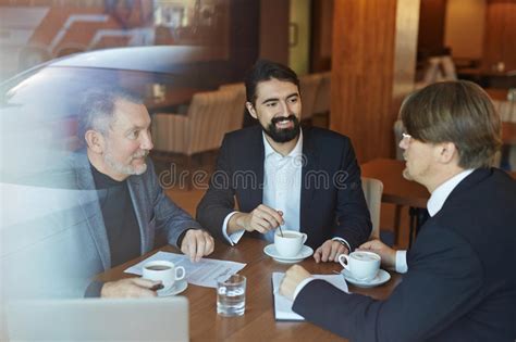 Let us know what you think down below. Project Discussion During Coffee Break Stock Photo - Image ...