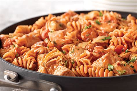 My parents came to america with two suitcases and this pasta recipe is great, especially for busy evenings! Rotini & Spicy Chicken in Tomato Sauce - Kraft Recipes