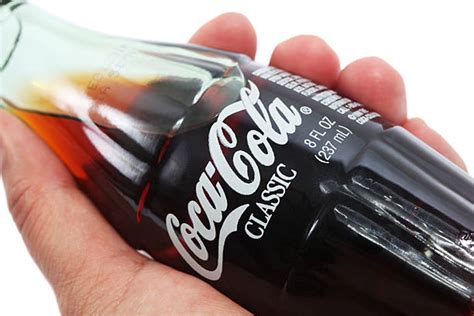 Best Hands Holding Coca Cola Stock Photos Pictures And Royalty Free