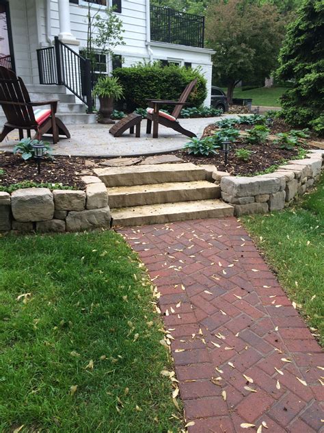 Natural Stone Steps With Limestone Retaining Wall At Front Door