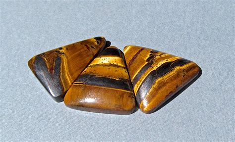 Three Golden Chatoyant Tiger Iron Cabochons Cts Total Etsy