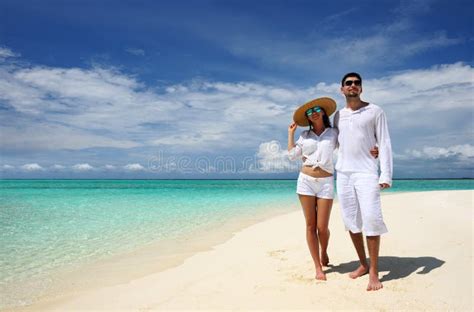 Vacation Couple Walking On Tropical Beach Maldives Stock Photo Image Of Blue Embracing