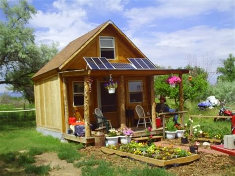 By using a single car battery, a single 100 watt solar panel and an inexpensive char. How To Build A 14×14 Solar Cabin For Under $2000 | Home ...