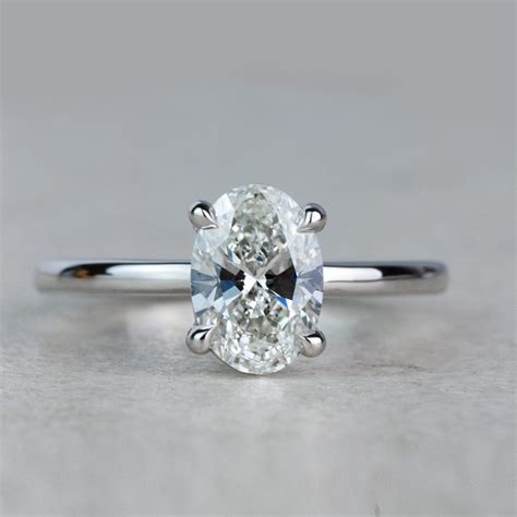 Stunning 1 Carat Oval Diamond Solitaire Engagement Ring