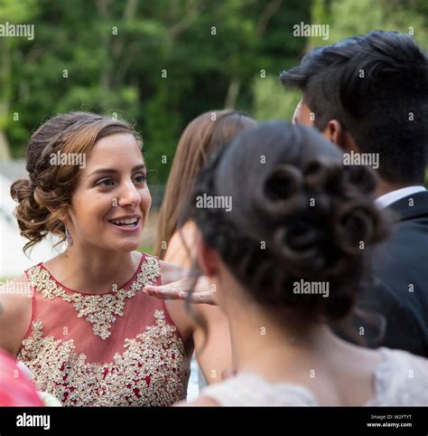 Girl In Formal Gown Talking With Friends And Getting Ready For Prom