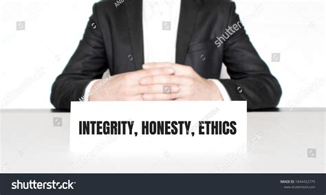 Businessman Sitting Table Signboard Text Integrity Stock Photo