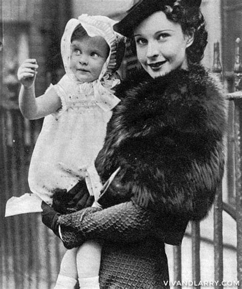 Vivien Leigh Holds Her Daughter Suzanne Holman Outside Of Their Home