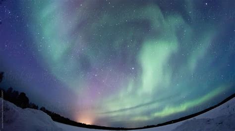 Northern Lights Creates A Display Of Light And Color On The Starry Sky