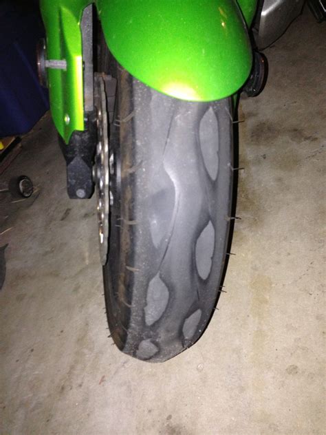 On a new tire, wear bars are almost invisible. Should my tires be replaced? : motorcycles