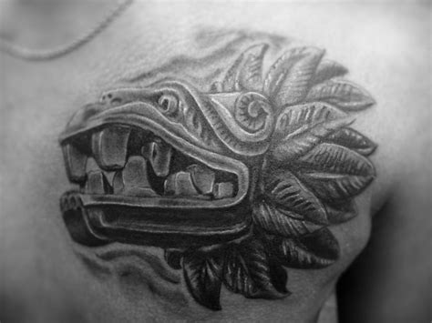 The mesoamerican dragons are important gods in the aztec and the mayan cultures. aztec-serpent-head-tattoo-on-chest.jpg (1024×768 ...