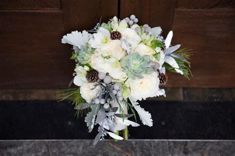 Winter Wedding Bouquet Using Succulents Eucalyptus Pinecones White