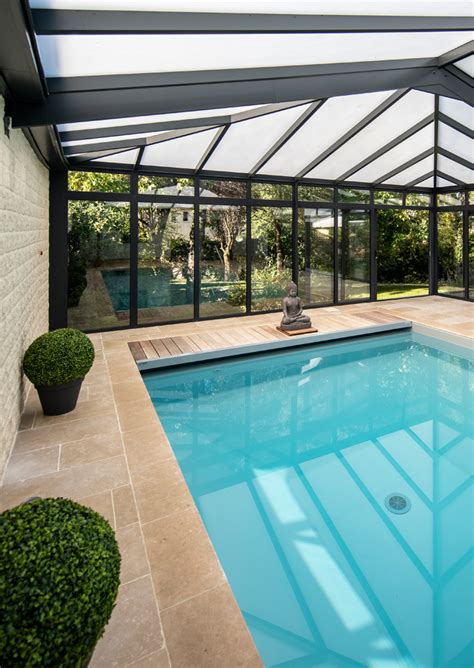 It is also a french noun meaning swimming pool; Design harmonieux d'une piscine intérieure sous véranda ...