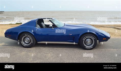 Classic Blue Chevrolet Corvette Sports Car On Seafront Promenade Stock