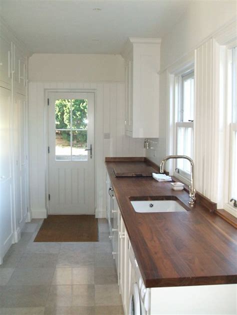 Are you struggling with laundry room storage? utility room off my dream kitchen for washing machine ...
