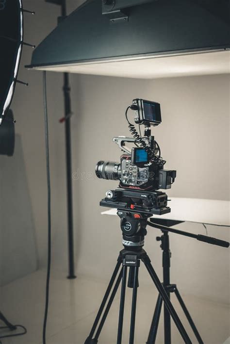 Modern Video Camera In A Studio With Movie Light Editorial Photo