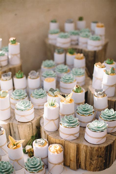 The shells are glued to wood skewers or wires, that are flexible and can be twisted and curved. DIY Beach Wedding by Ronel Kruger | SouthBound Bride
