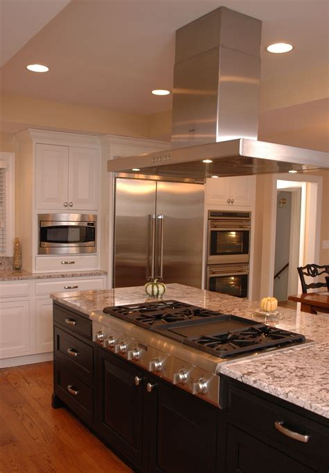 Each color features the 40 leading ikea kitchen furniture. White kitchen, dark island and Stainless Steel | Gorgeous ...