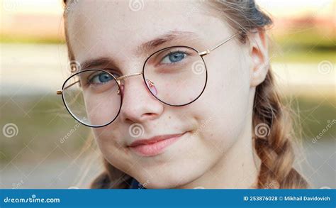 A Teenage Girl Wearing Glasses Close Up Of Her Face Stock Photo