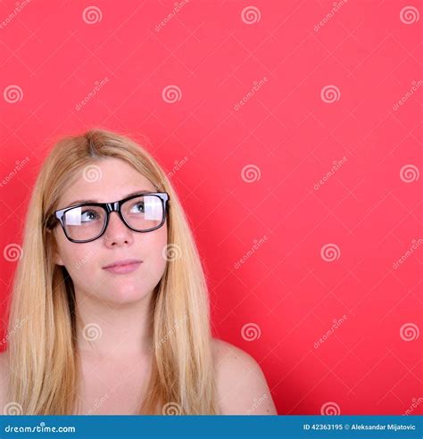 Portrait Of Beautiful Girl Looking Up Against Red Background Stock Image Image Of Background
