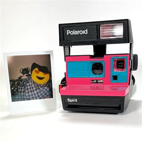 Polaroid Sun 600 With Upcycled Pink And Turquoise Face Refreshed