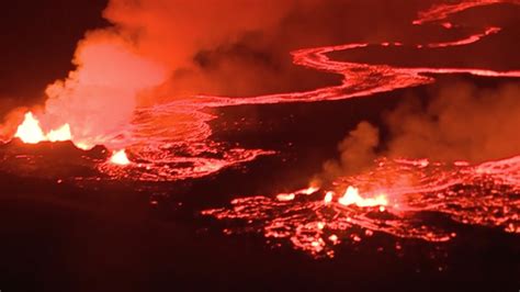 Kilauea Volcano Turns Eerie As Lava Burns Red Against Darkness Of