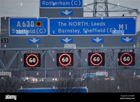 Signs And Variable Speed Limits Above Each Lane Of The M1 Motorway