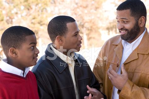Father Talking To His Sons Stock Photo Royalty Free Freeimages