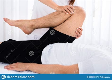 Masseur Giving Leg Massage To Man Stock Image Image Of Masseuse Body
