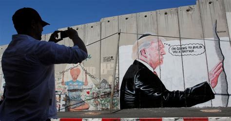 Donald Trump Graffiti Appears On West Bank Barrier Mocks His Love Of Border Walls National