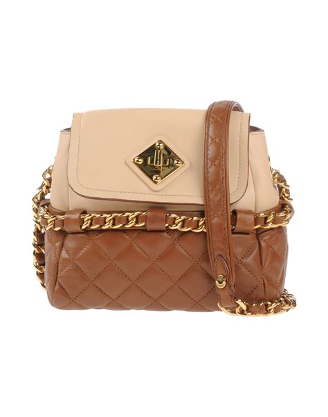 Moschino Underarm Bags In Brown Lyst