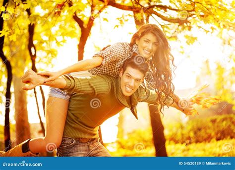 Playful Couple Enjoying Outdoors Stock Image Image Of Sunlight