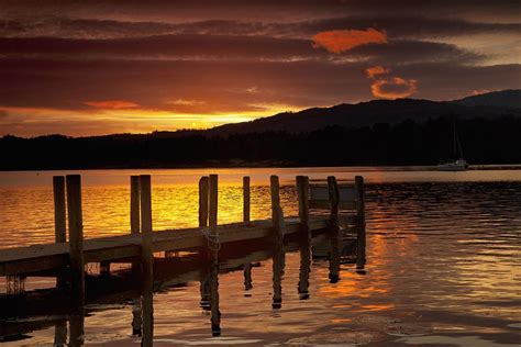 Sunset Over Dock At Lake Windermere Photograph By John Short