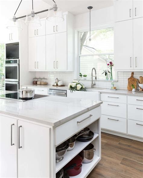 Before And After A Dated Wood Kitchen Goes All White And Bright