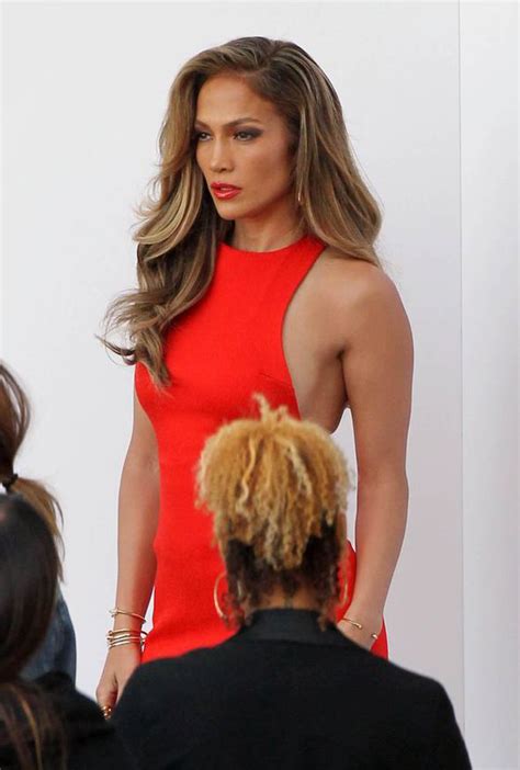 j lo wows in sexy scarlet dress as she arrives at americal idol filming