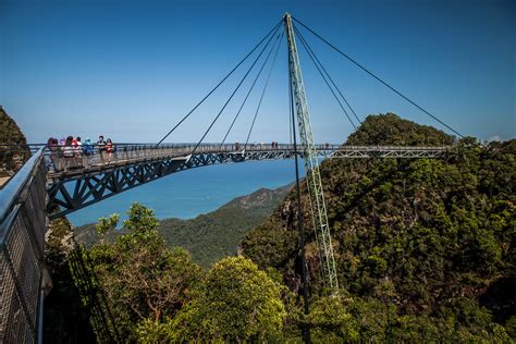 This magnificent curved bridge finished construction in 2005 and essentially connects to parts of the mountain called gunang mat cincang which are langkawi's the price of the sky bridge only is about: Langkawi Sky bridge, Malaysia | Loving this little lens ...