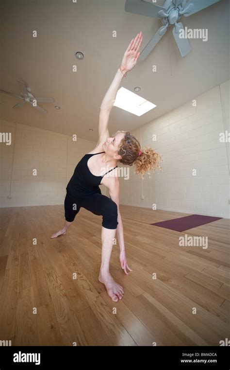 Woman In Yoga Pose Stock Photo Alamy