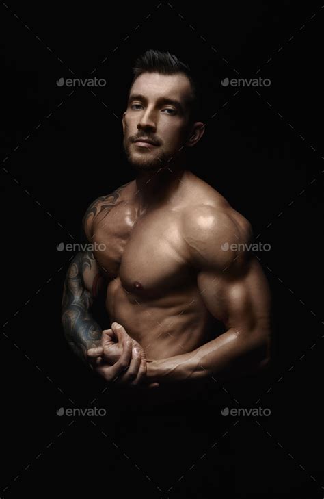 Strong Athletic Man Showes Naked Muscular Body Stock Photo By Prostock Studio