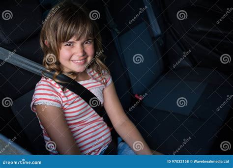 Happy Teenage Girl Sitting In The Back Seat Of Car Stock Photo Image
