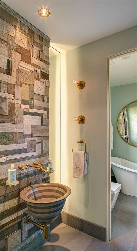 There's no rule that says backsplash has to be made of tile—mix it up with wood planks set vertically. Salvaged Style: 10 Ways to Transform Your Bathroom with ...