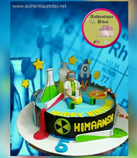 The Cake Is Decorated With An Image Of Science And Laboratory Equipment