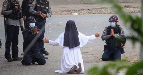 myanmar nun becomes symbol of resistance as she puts herself between police and protesters