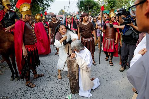 Catholic Devotees Volunteer To Be Crucified As Part Of A Good Friday Ritual In The Philippines