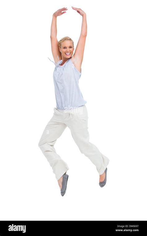 Blonde Woman Jumping Like A Ballerina Stock Photo Alamy