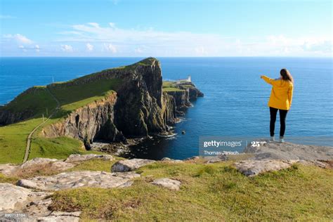 Maybe you would like to learn more about one of these? Girl Pointing At Neist Point Lighthouse Scotland High-Res ...